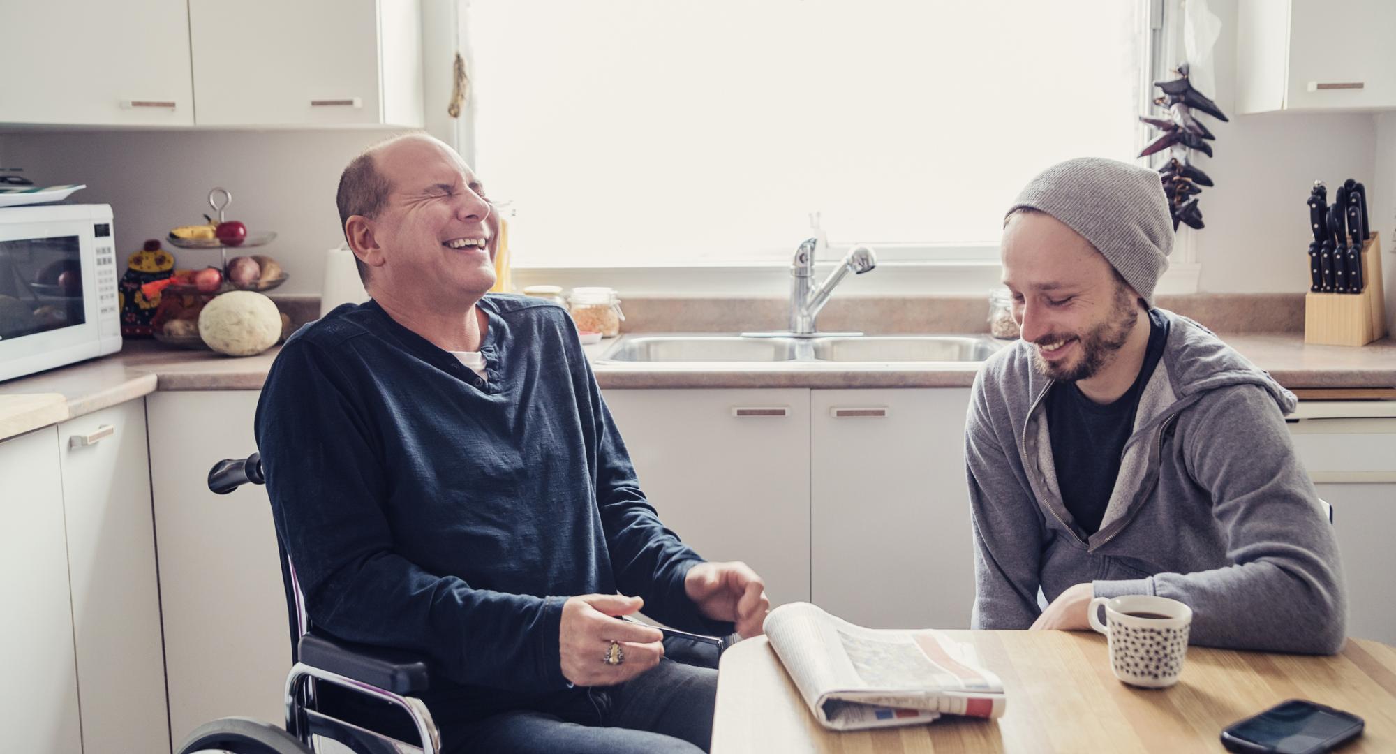 Disabled person receiving support in their home