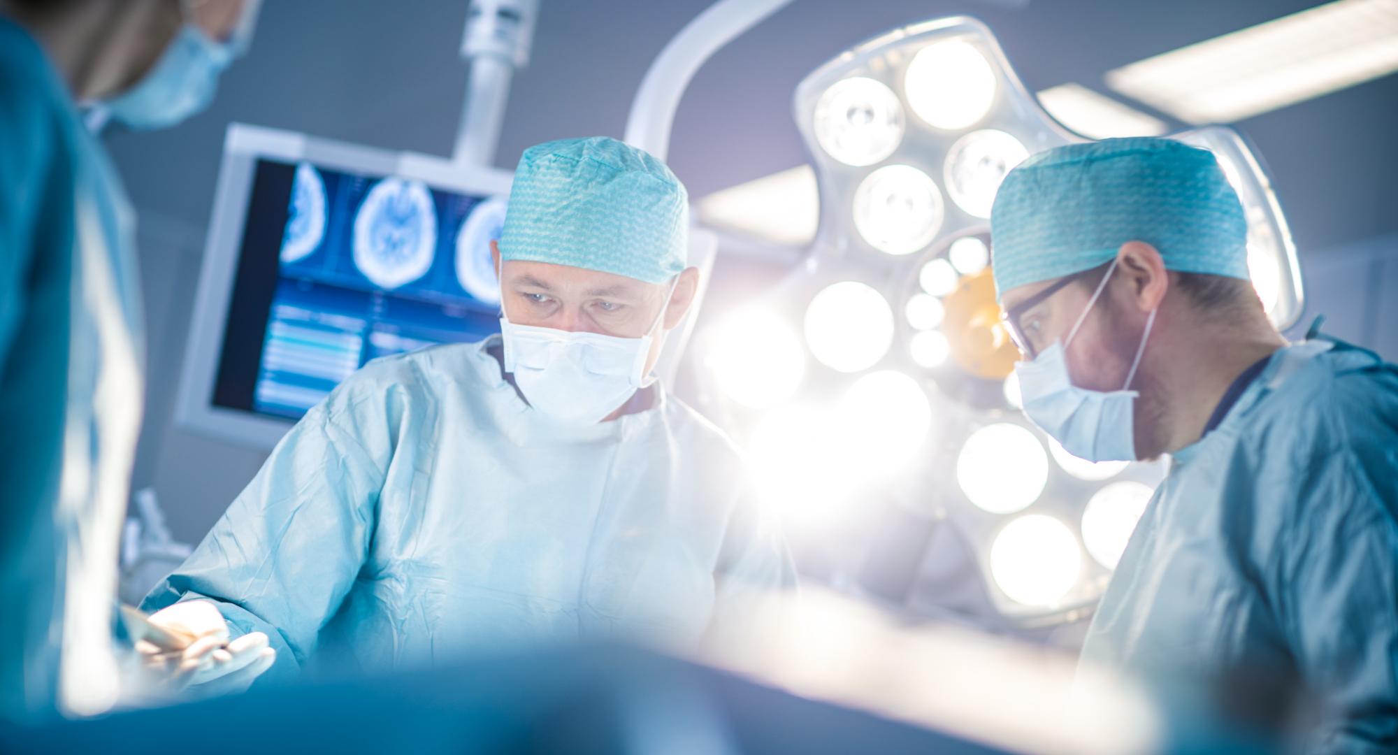 Surgeons working in an operating theatre