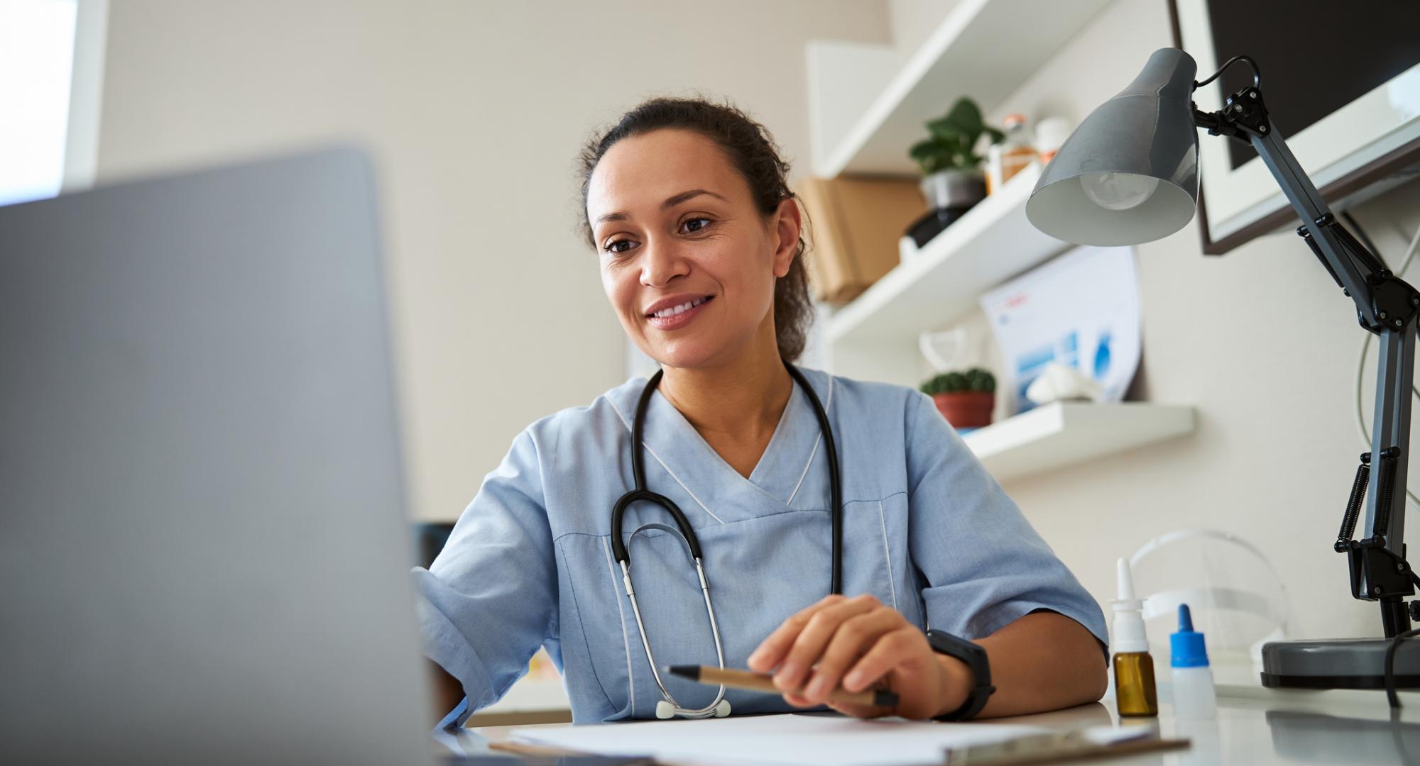 GP using a computer for a remote appointment