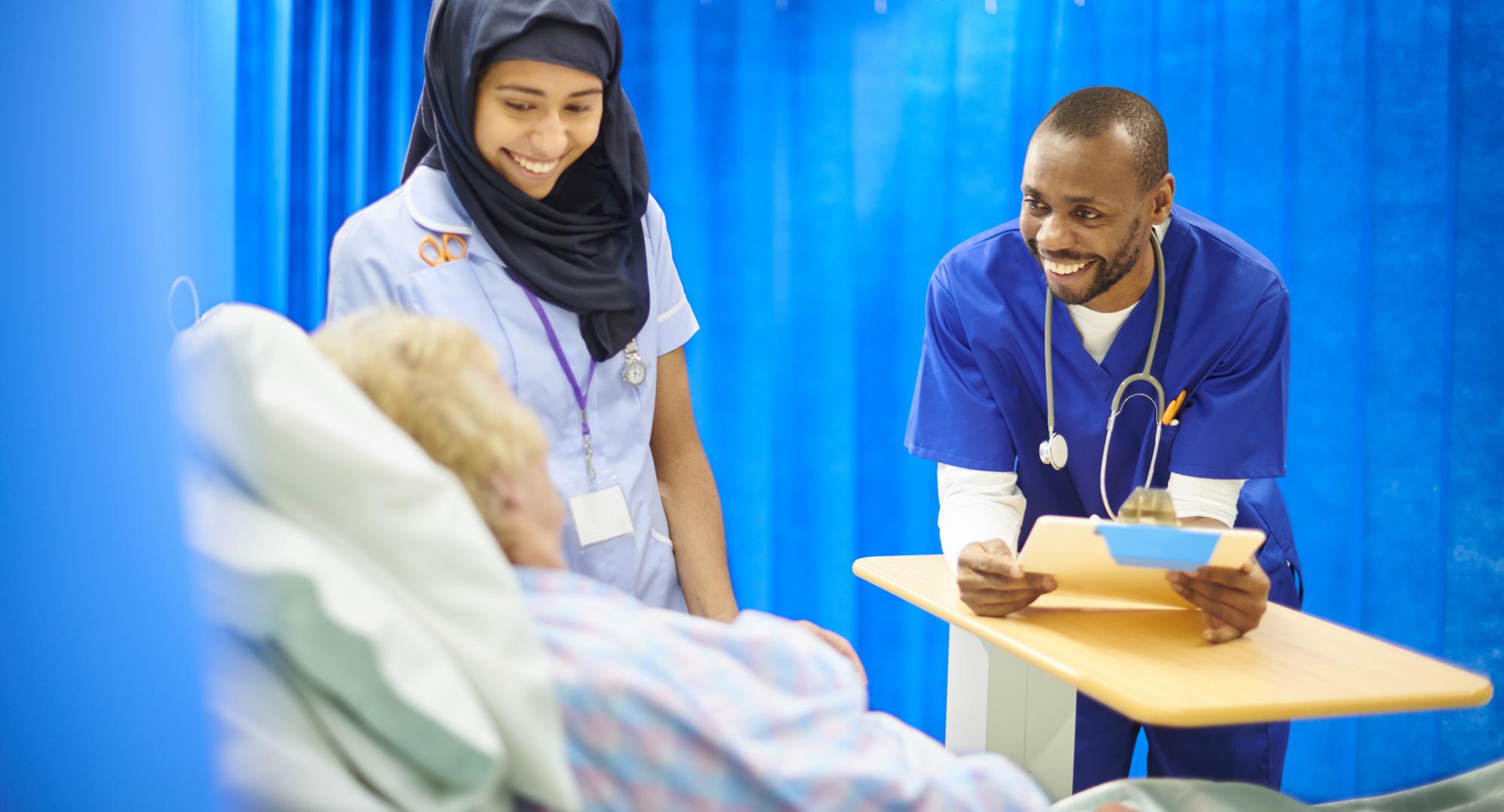 Nurses talking with a patient