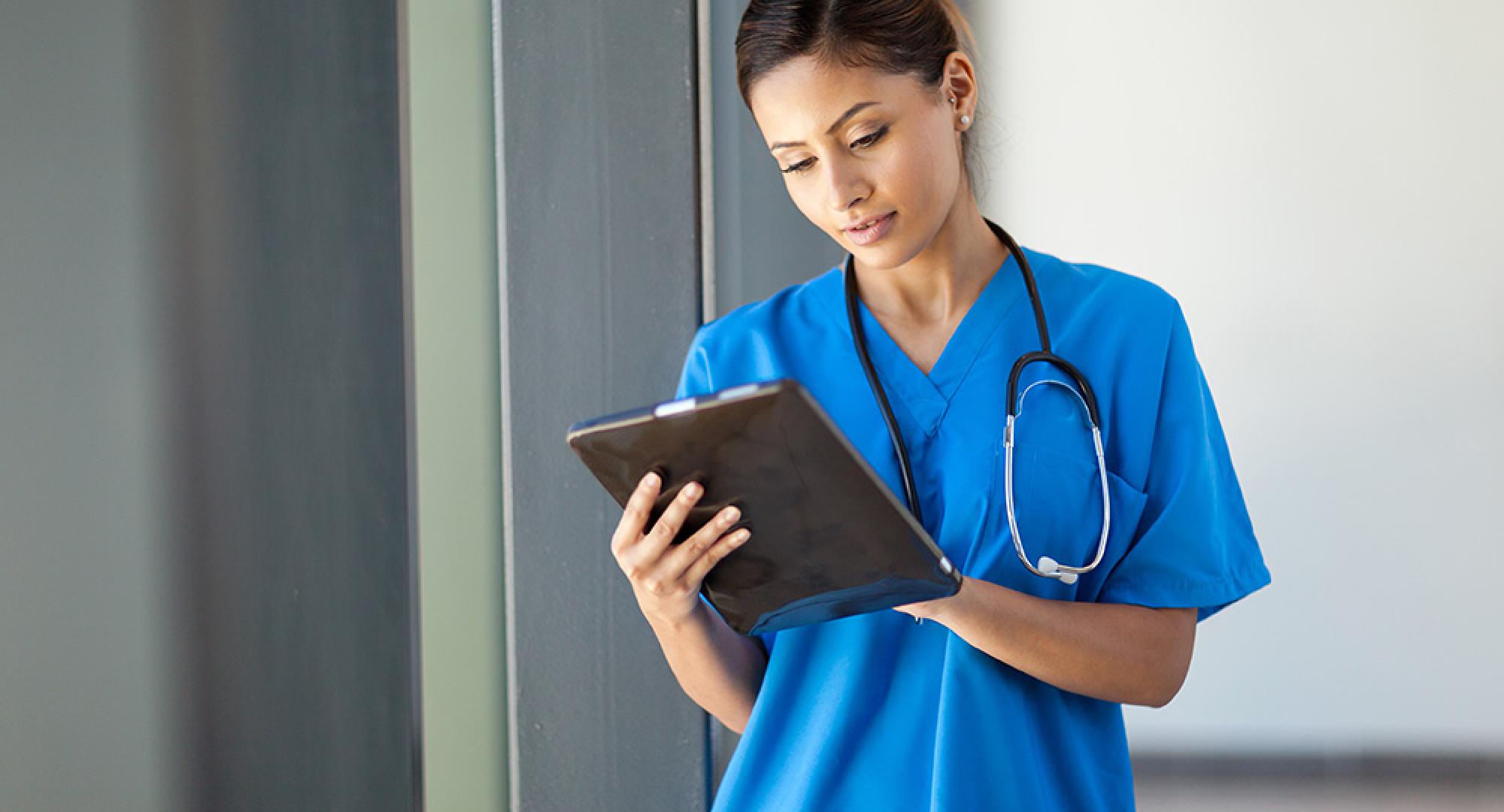 Health worker using a clipboard