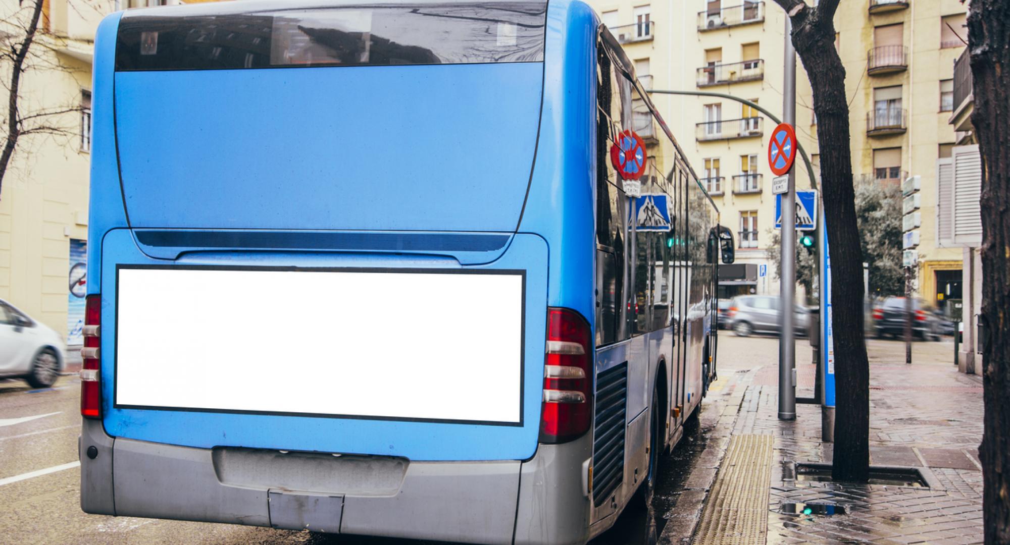 Rear-view shot of a blue bus