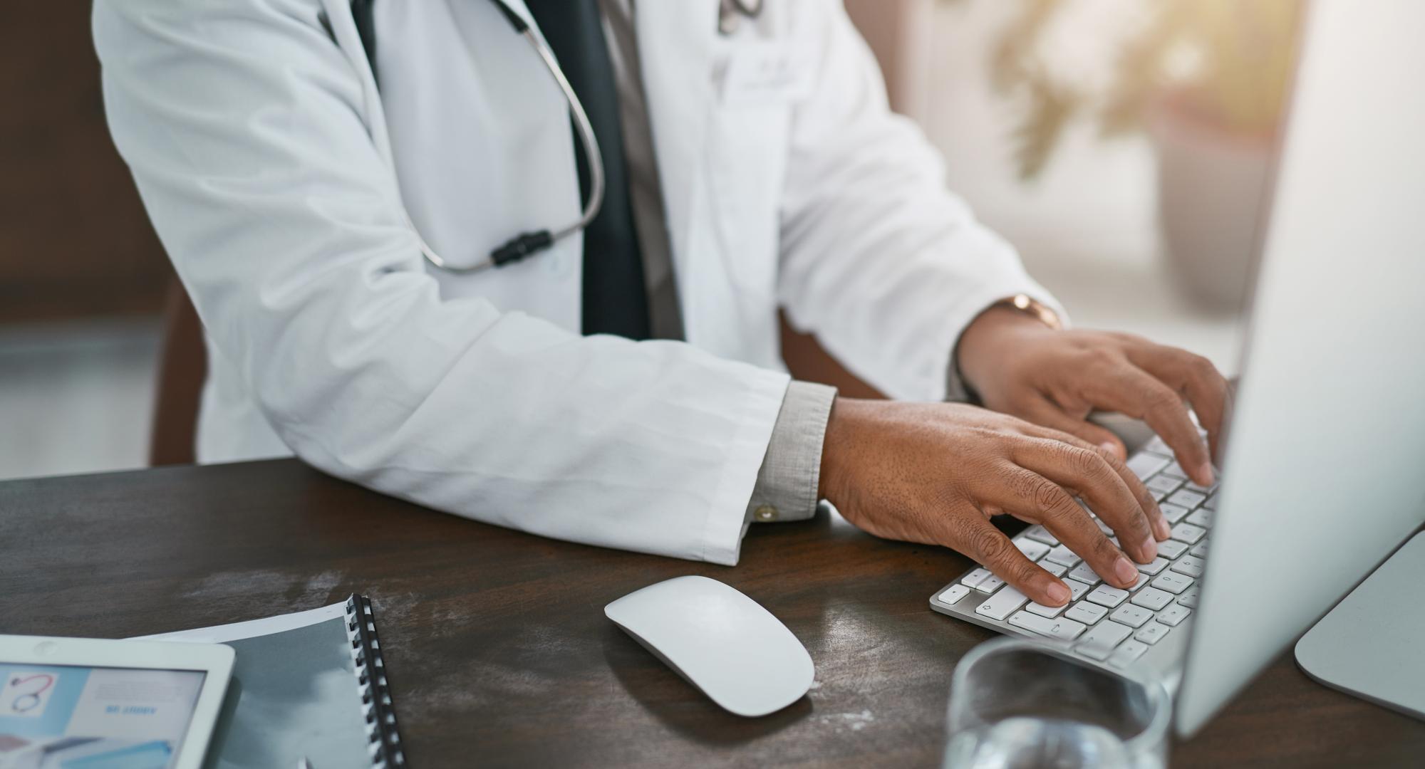 physician at desk, via Istock 
