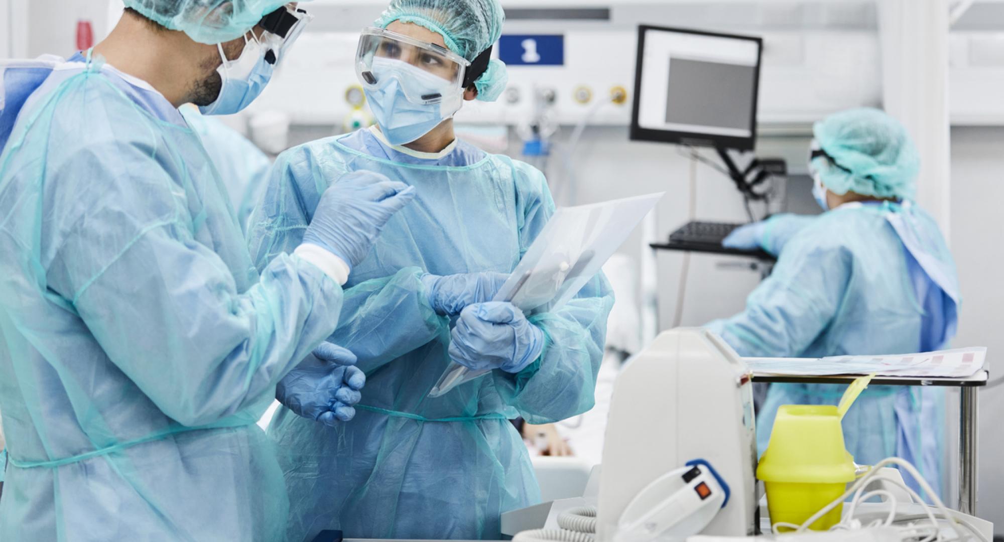 Health professionals working in an intensive care unit