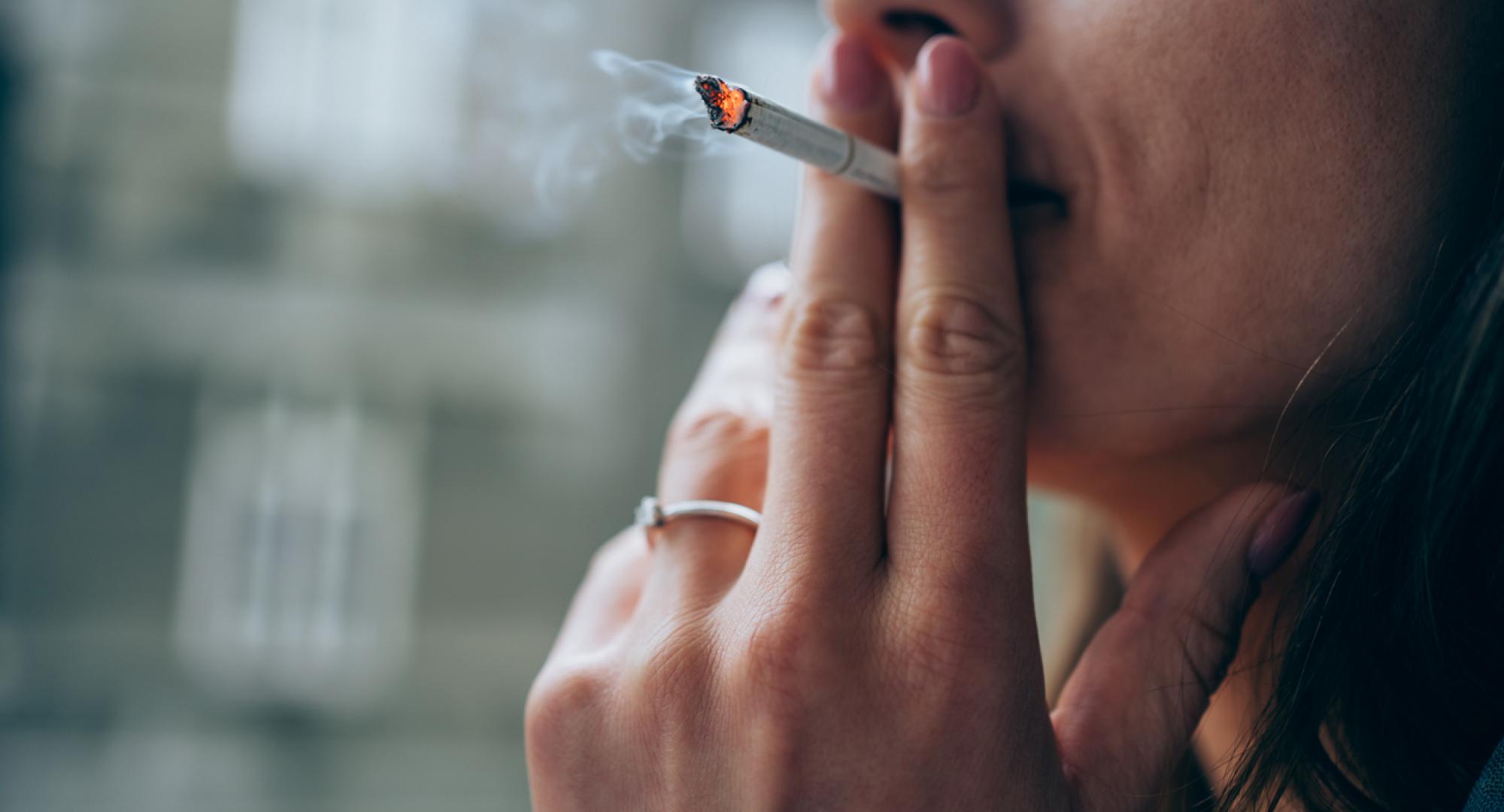 Young woman smoking a cigarette