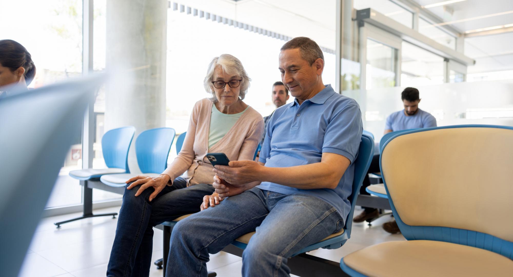 Man and woman in hospital waiting room