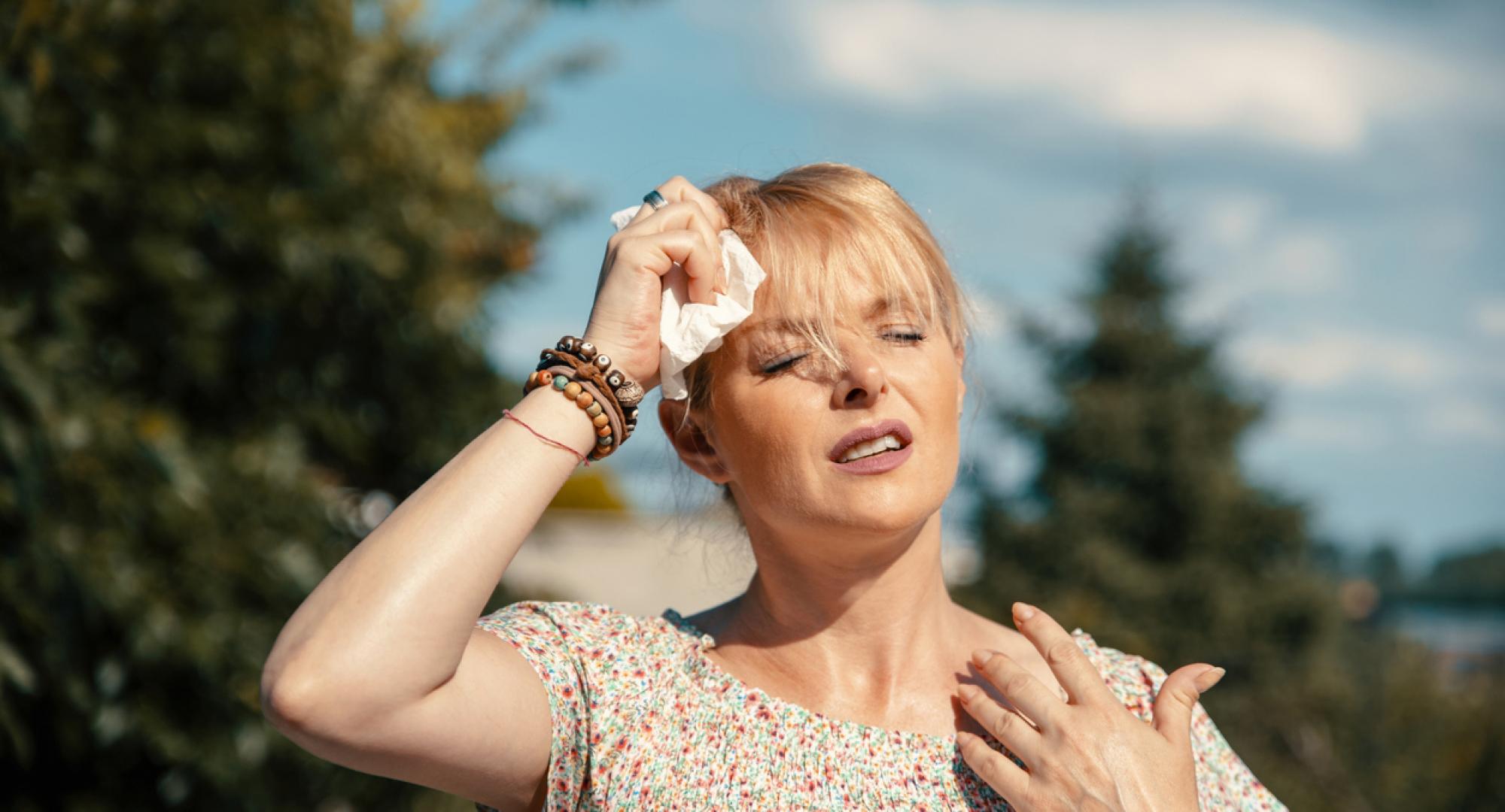 Woman experiencing extreme heat