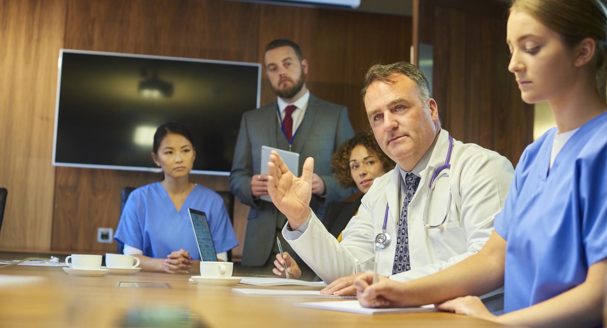NHS Staff discussing