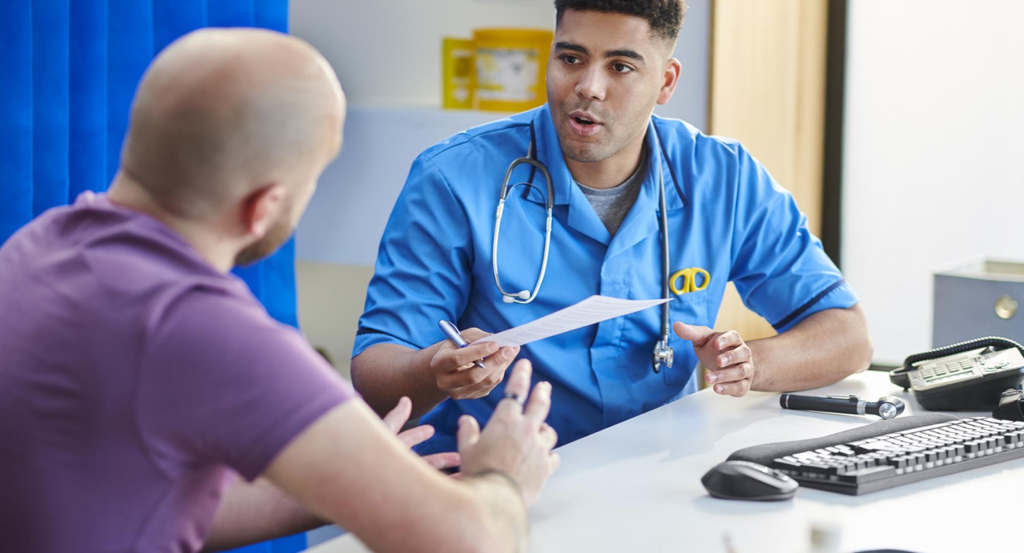 NHS doctor testing a patient
