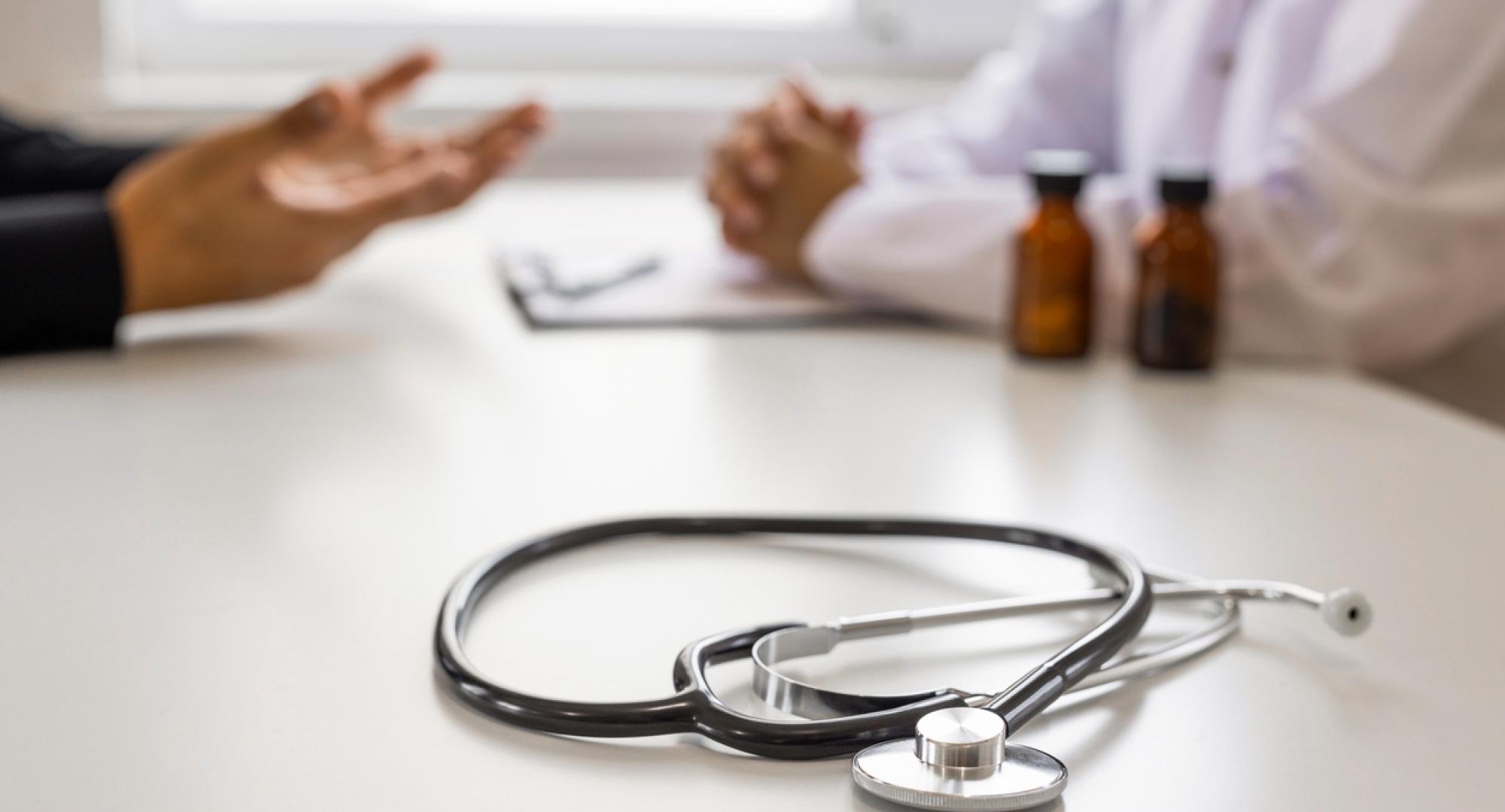 GP appointment depicting a cancer diagnosis