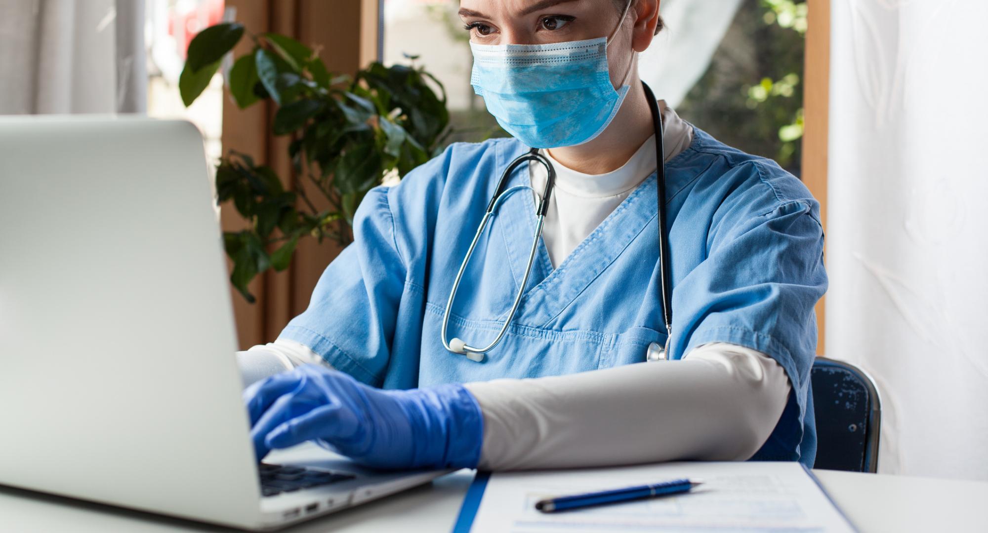 Nurse using computer