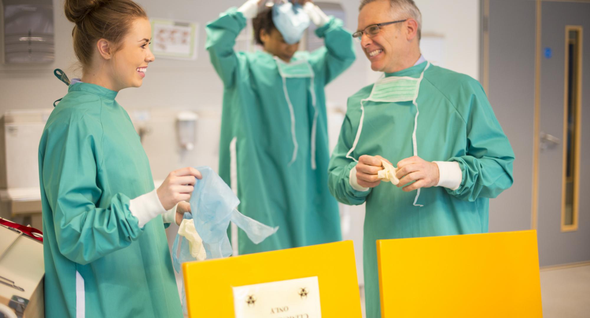young nurse disposes of clinical waste