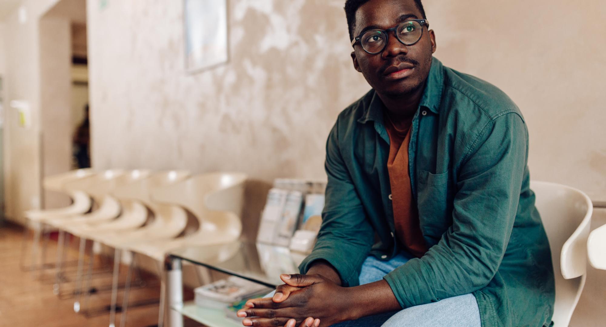 Black man in waiting room