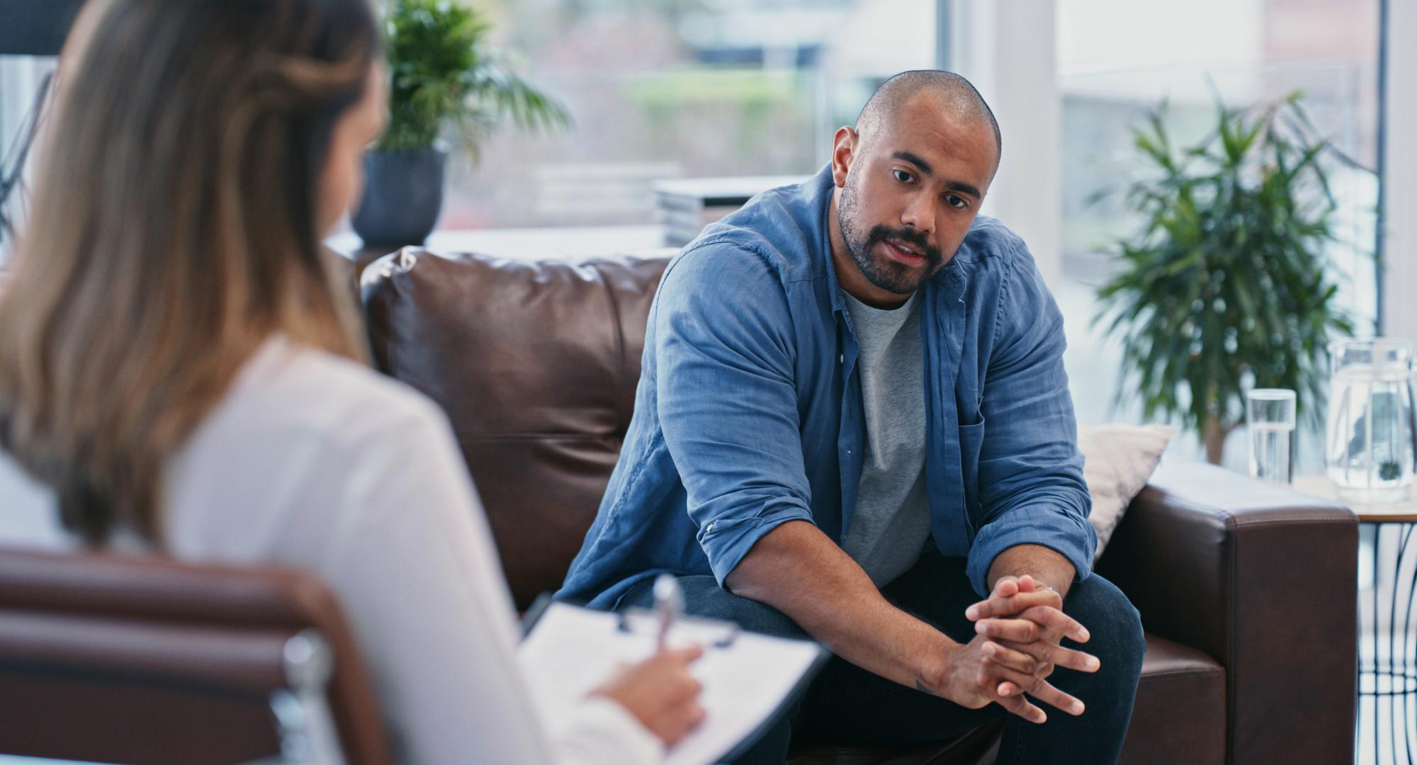 Man talking to a therapist