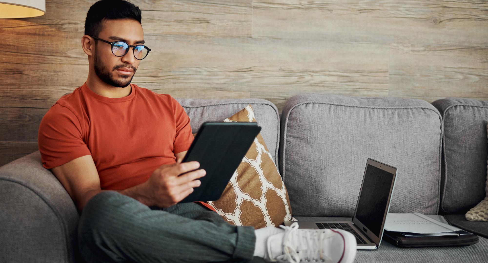 Man using an ipad at home