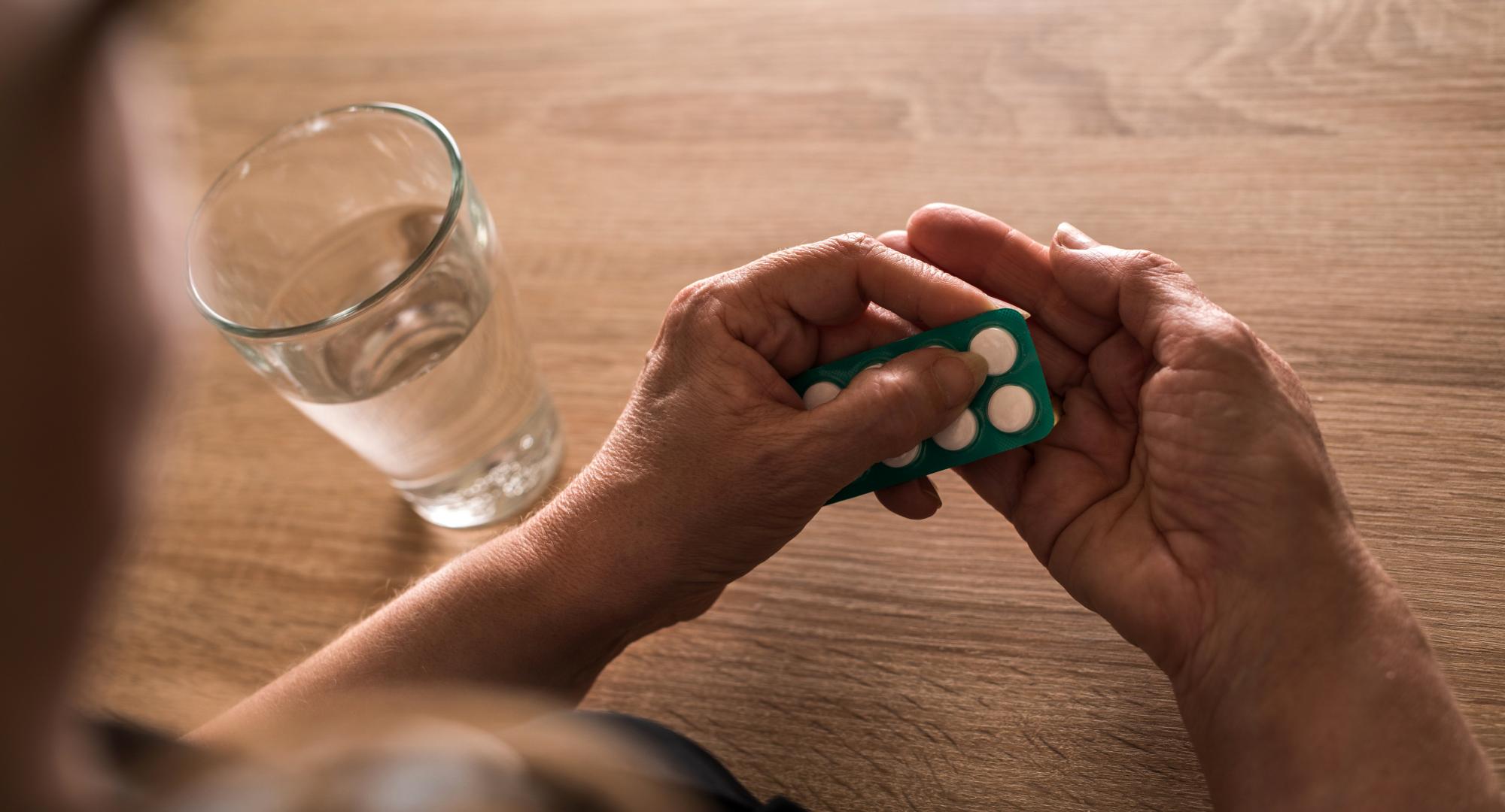 woman taking antibiotics