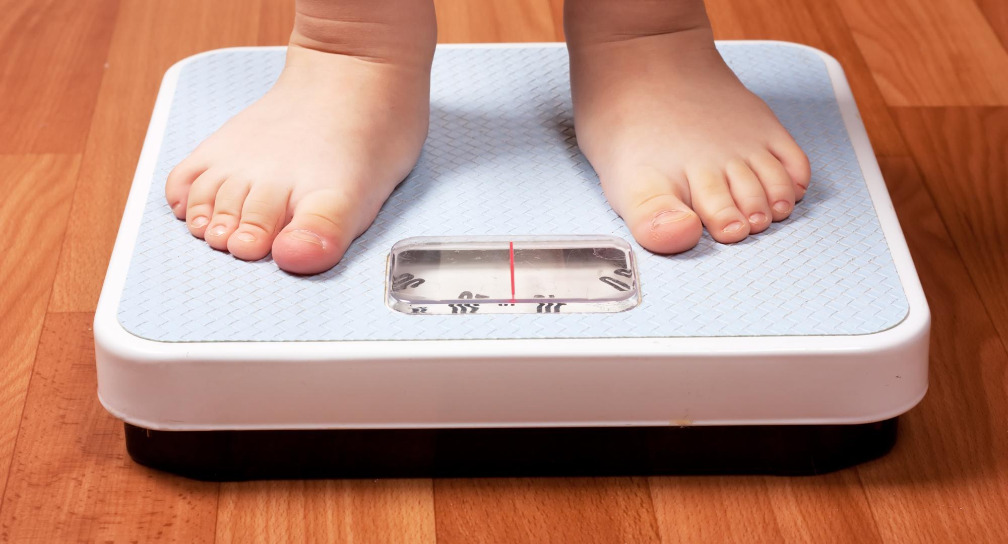 Child on a weighing scale