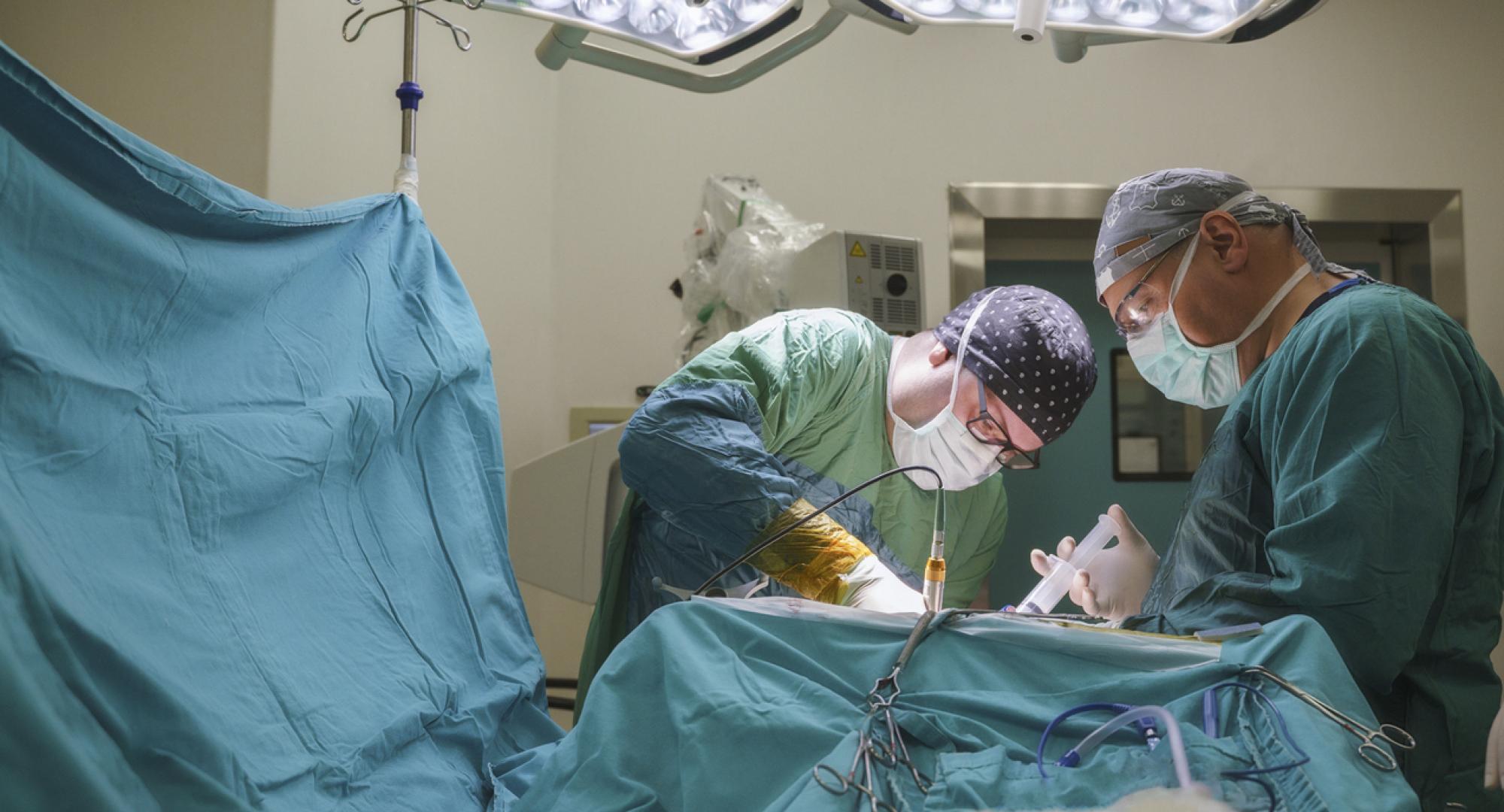 Neurosurgeon team operating