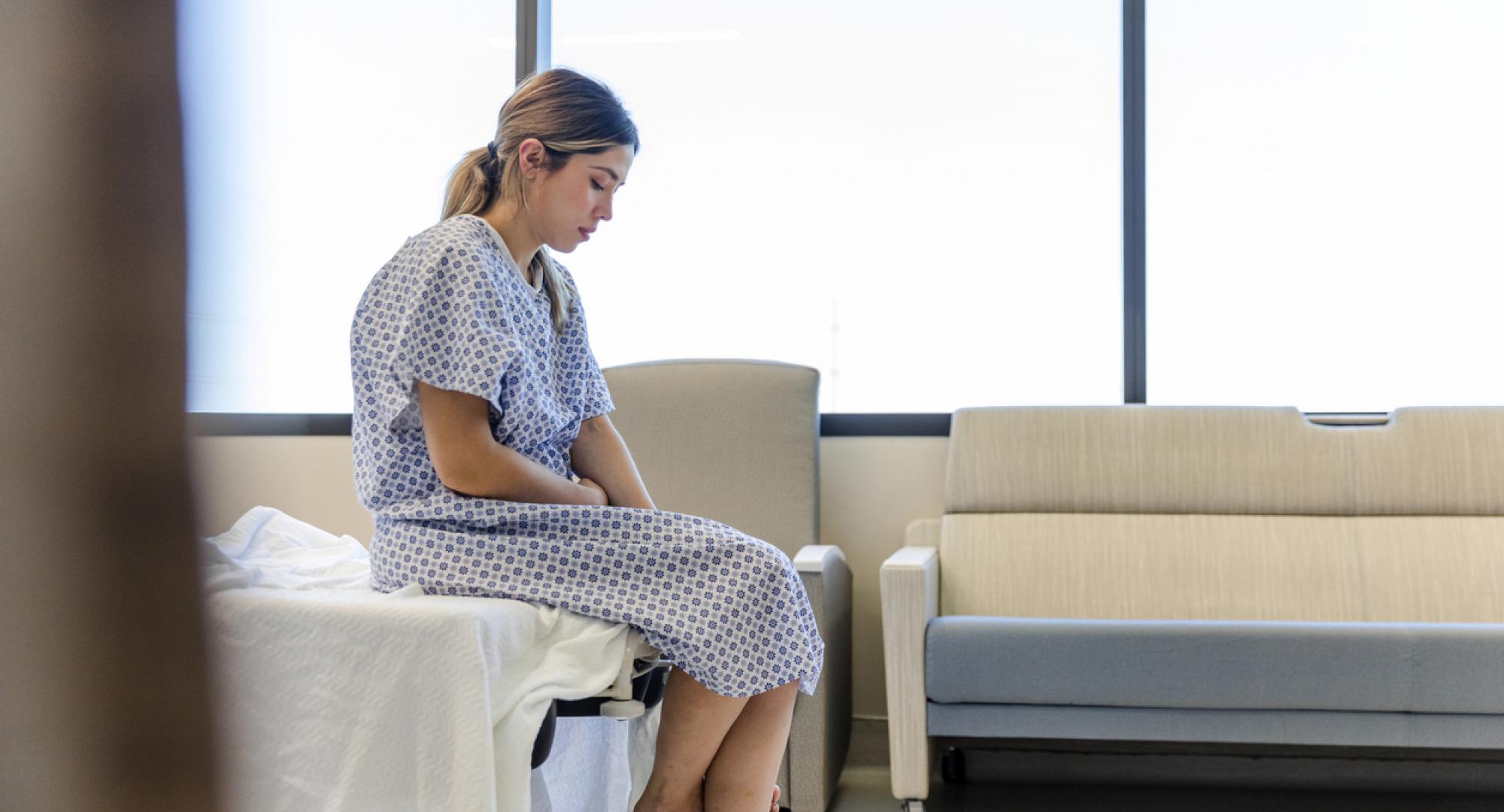 Woman upset after suffering miscarriage