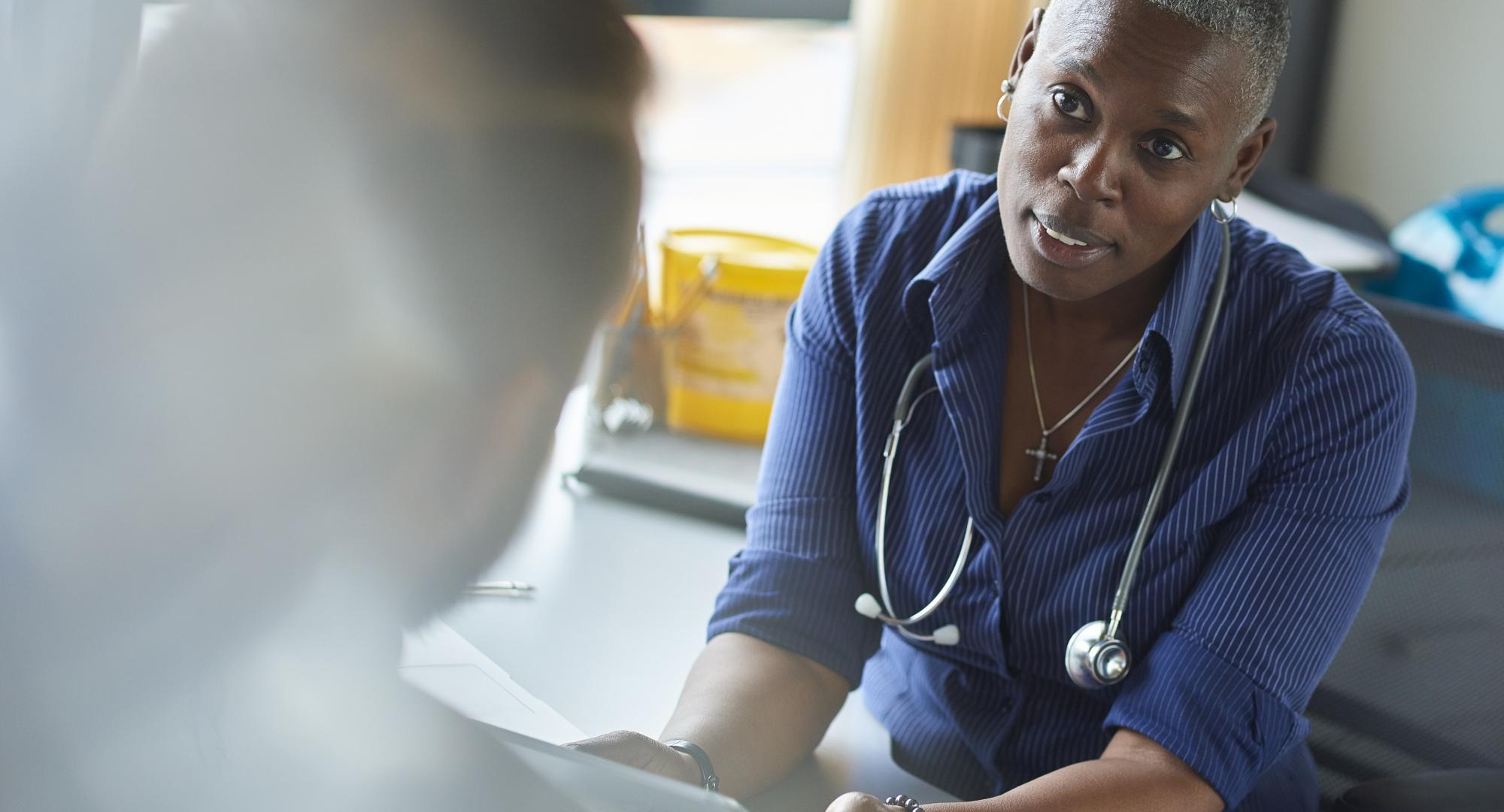 A doctor providing mental health support