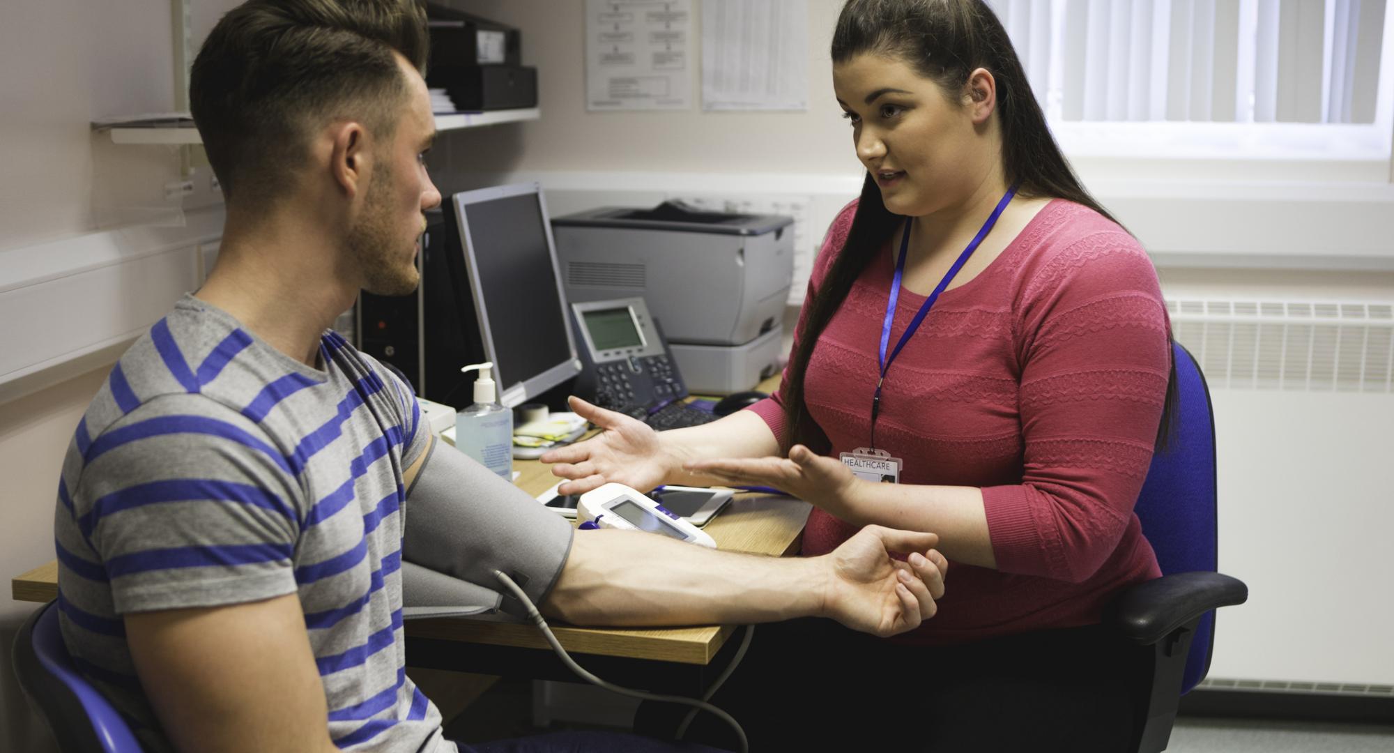 A GP with a patient