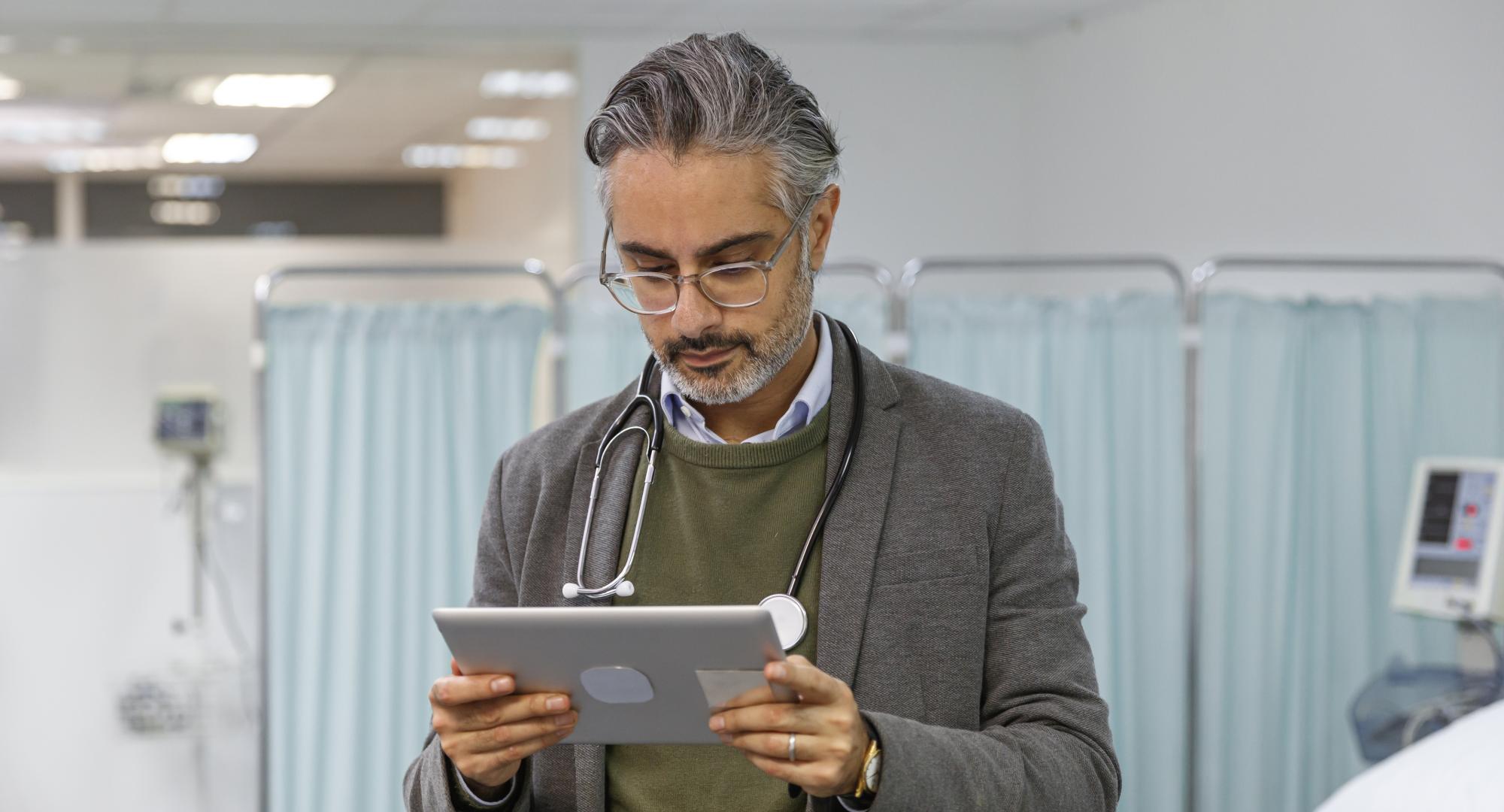 Doctor reviewing patient medical record