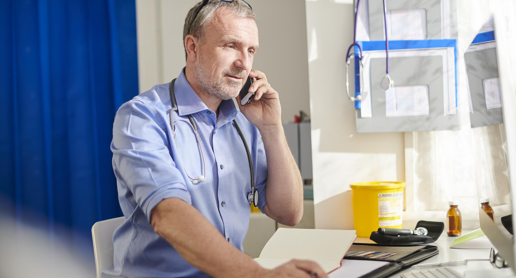 GP at his desk