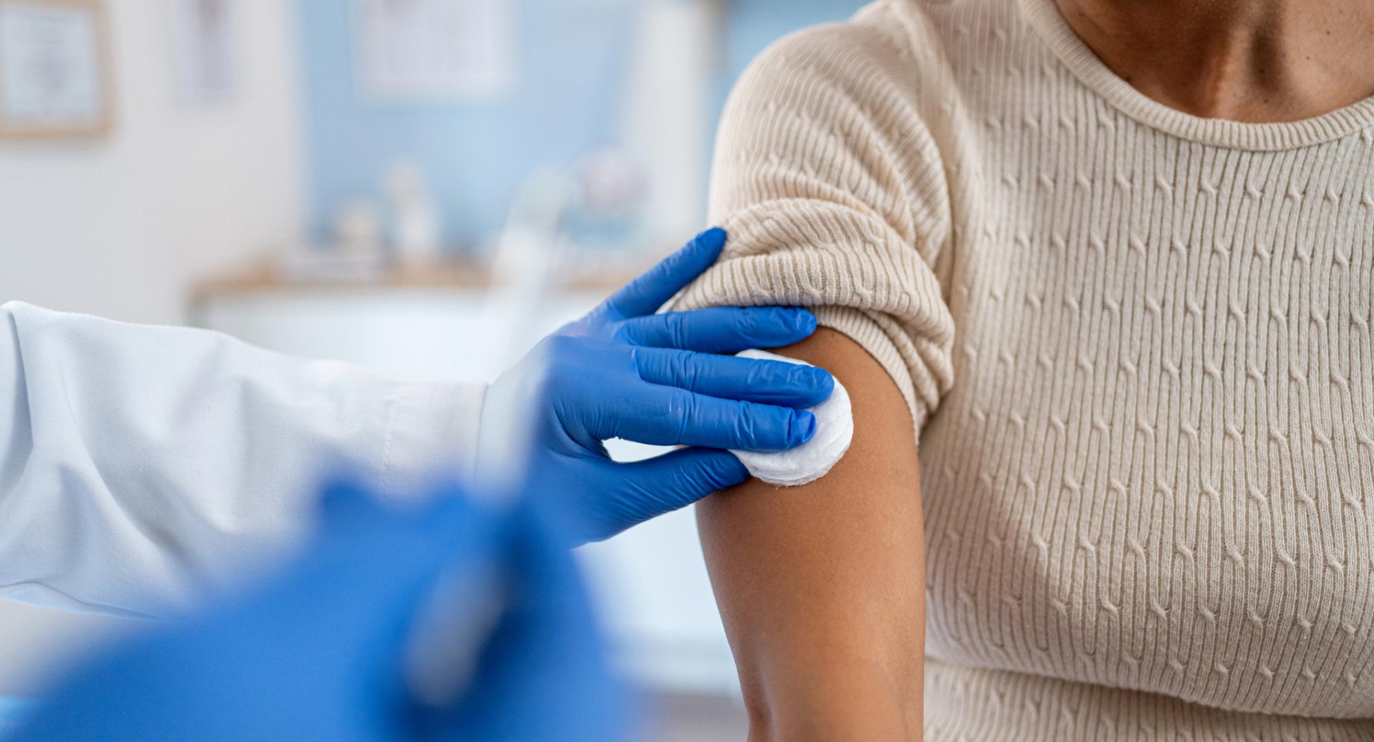Woman being vaccinated