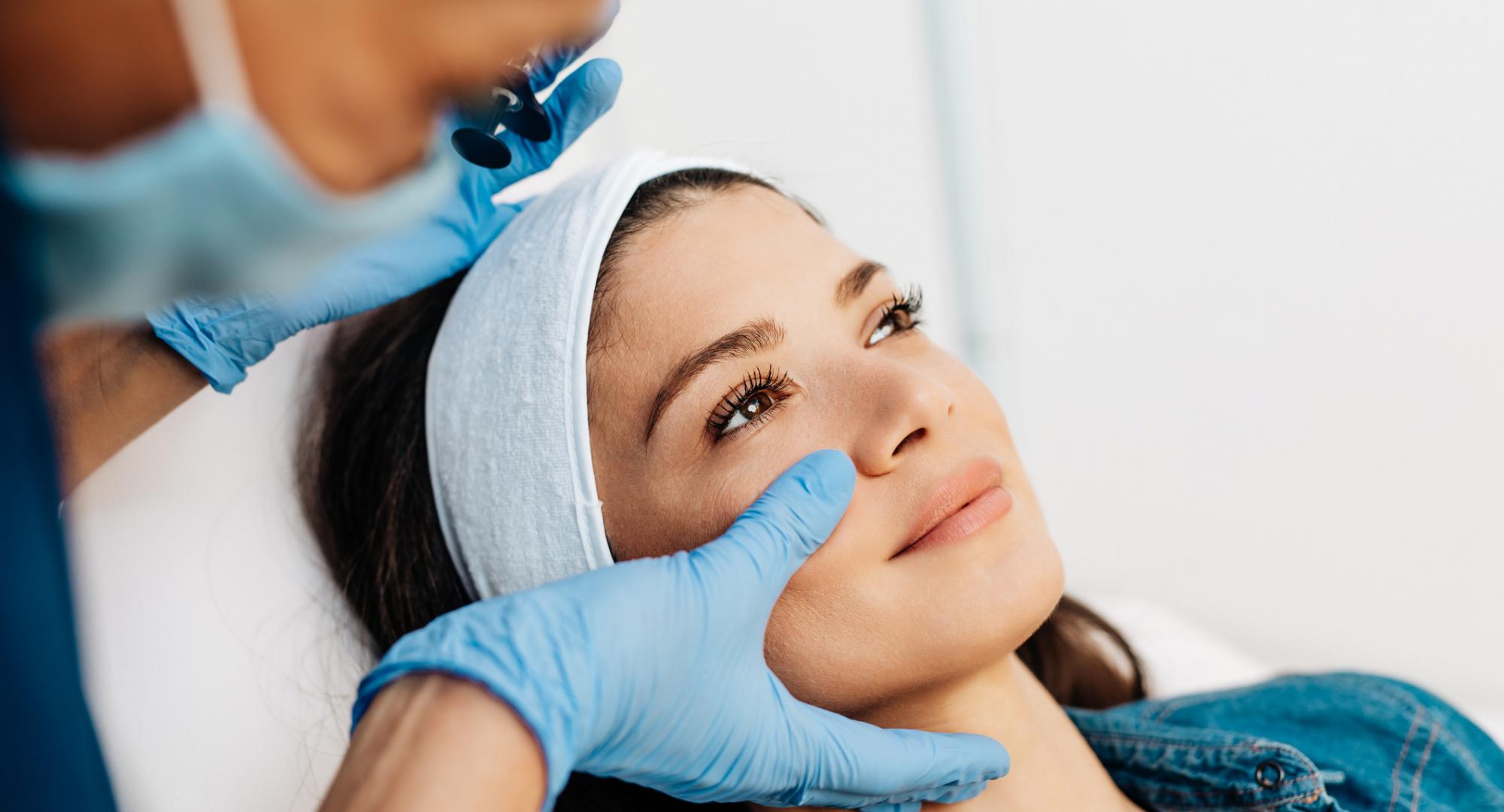 Young woman undergoing a cosmetic procedure