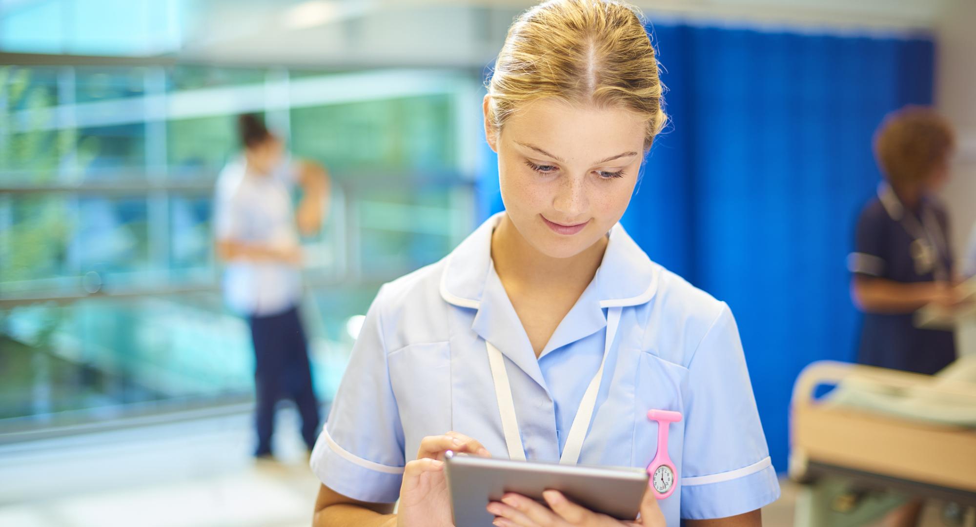 young nurse using a tablet