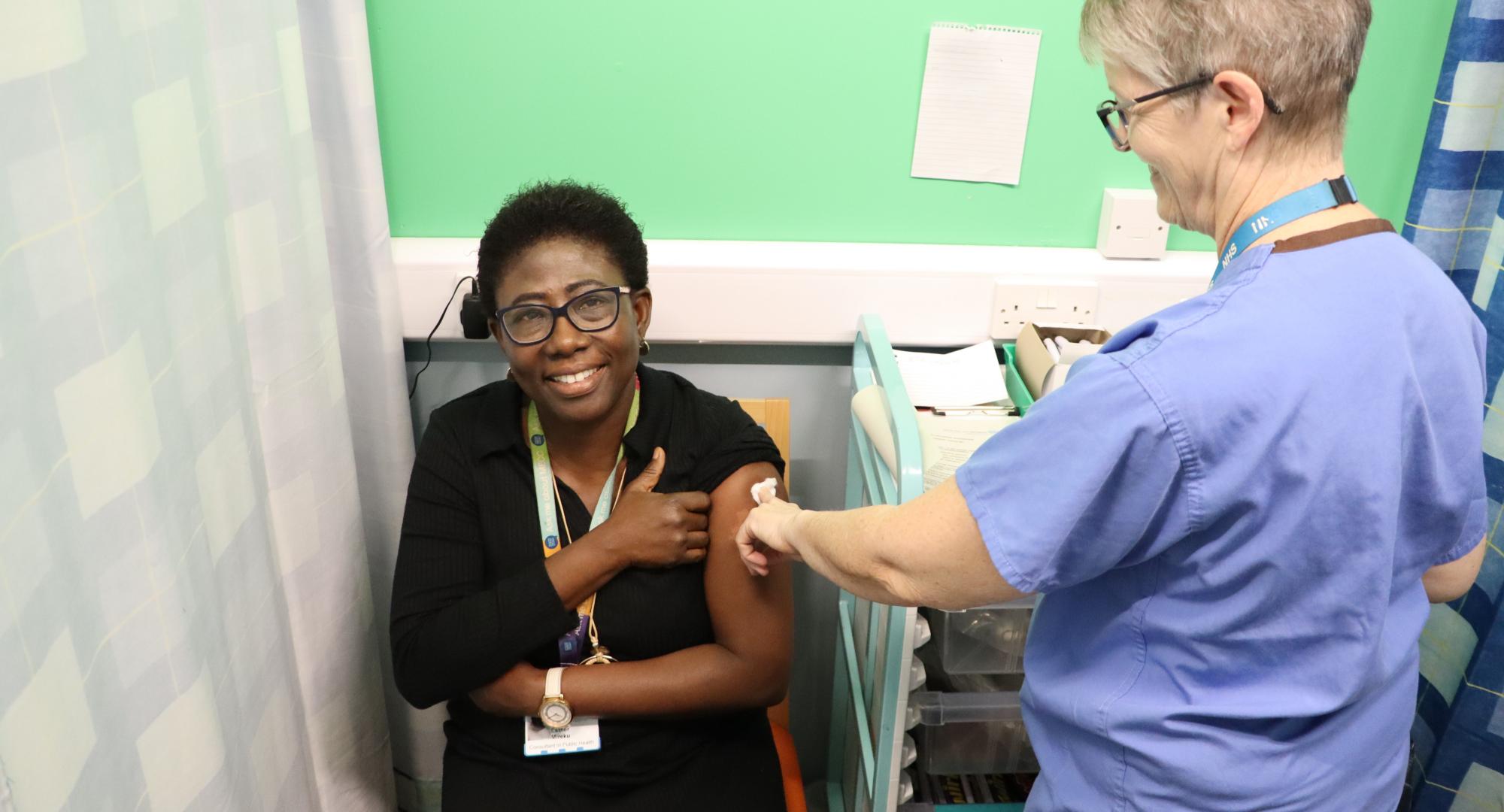 Esther Mireku, public health consultant, having a flu vaccine recently