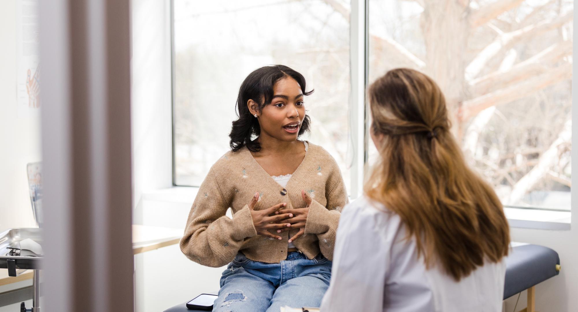 Teenager talking to therapist