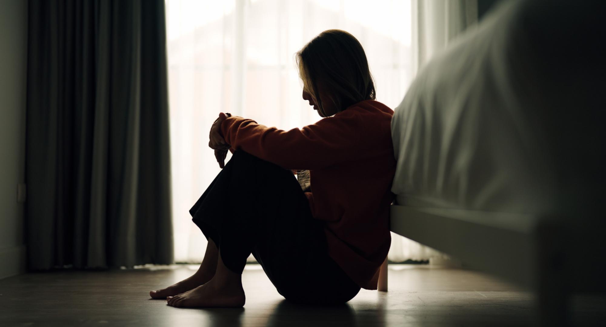 A woman struggling with her mental health