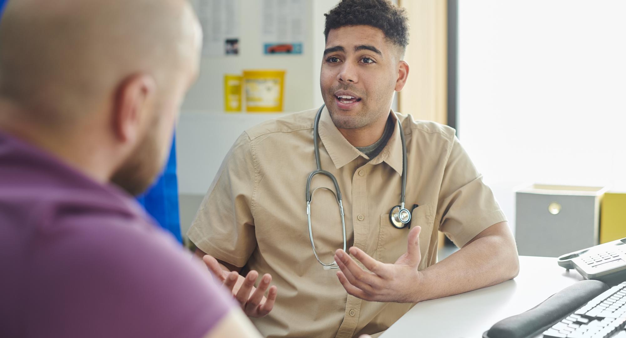 Gp explaining to patient