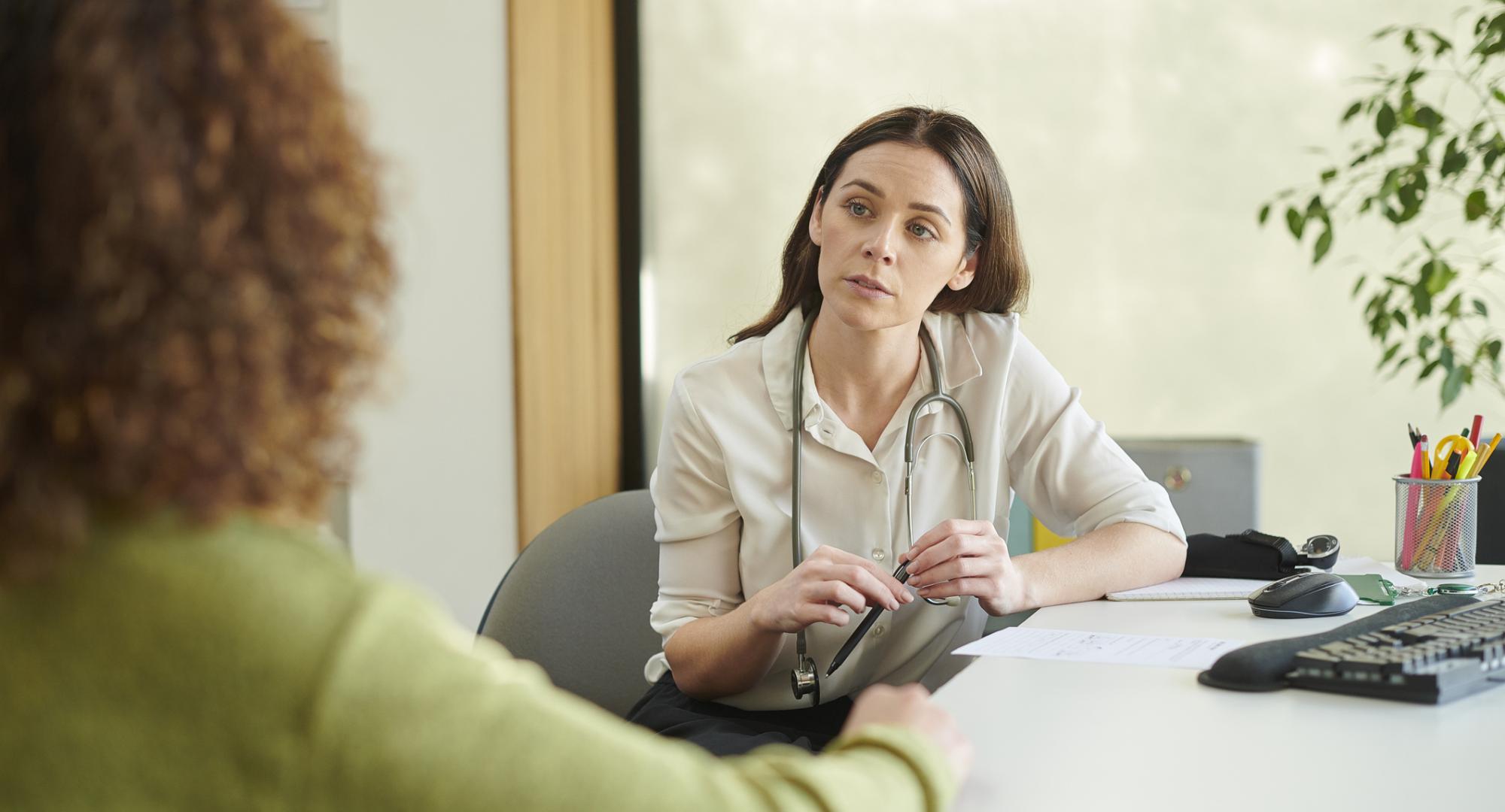 Woman talking to a female GP