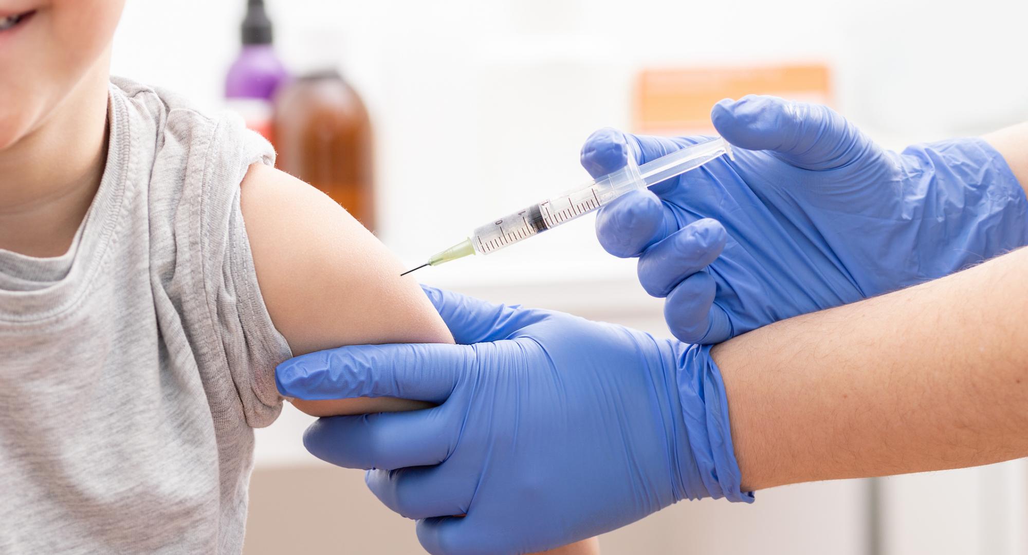 Child being vaccinated