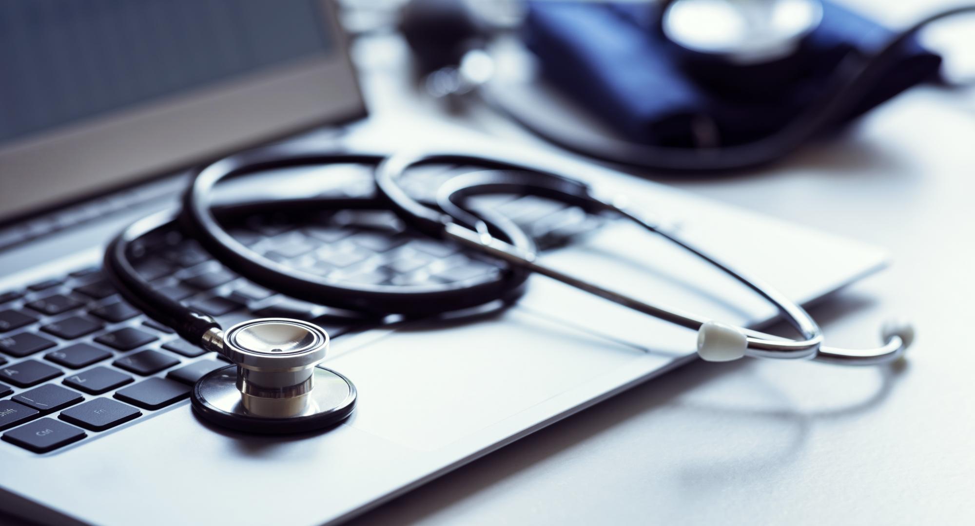 AI enabled stethoscope on laptop keyboard