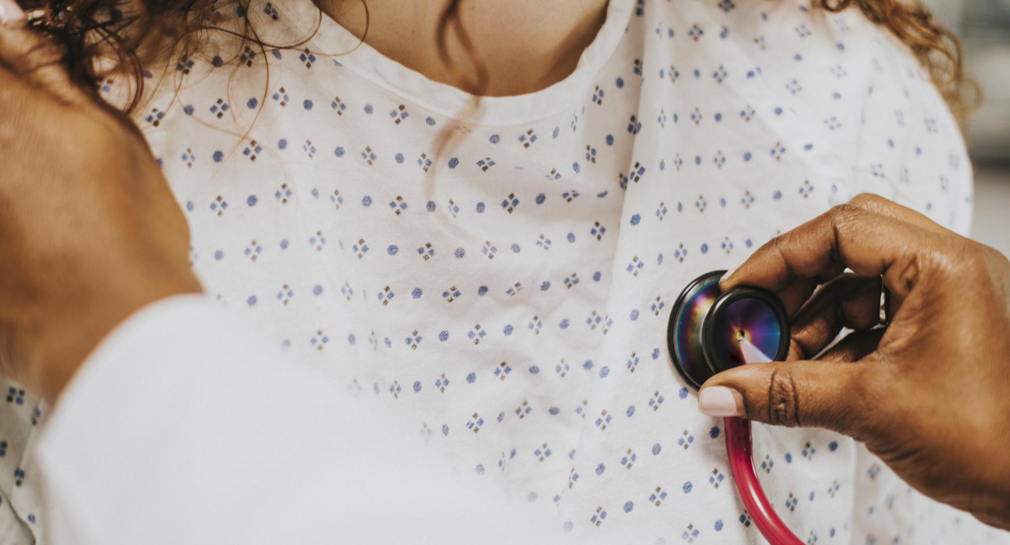 Woman having her heart checked
