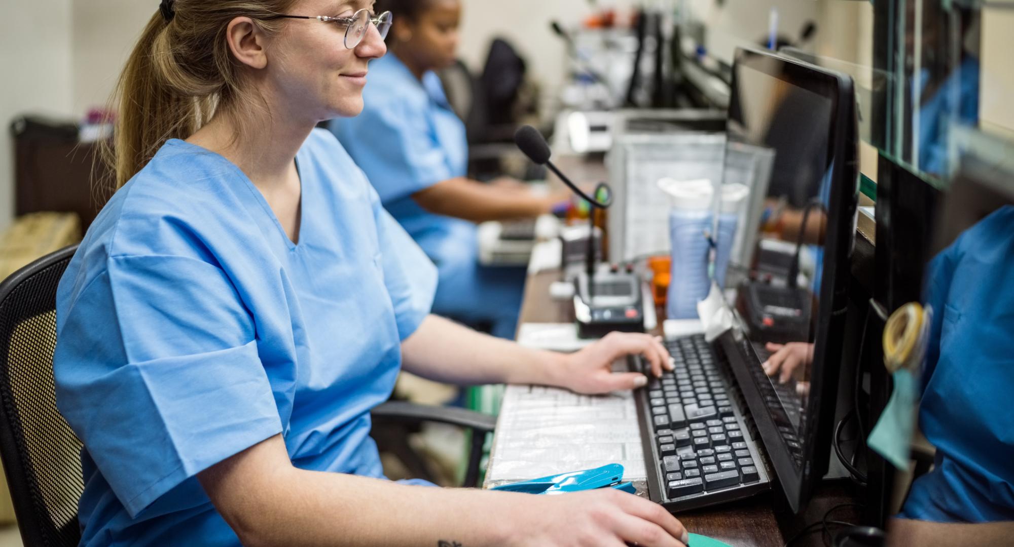 Nurse using a hospital computer