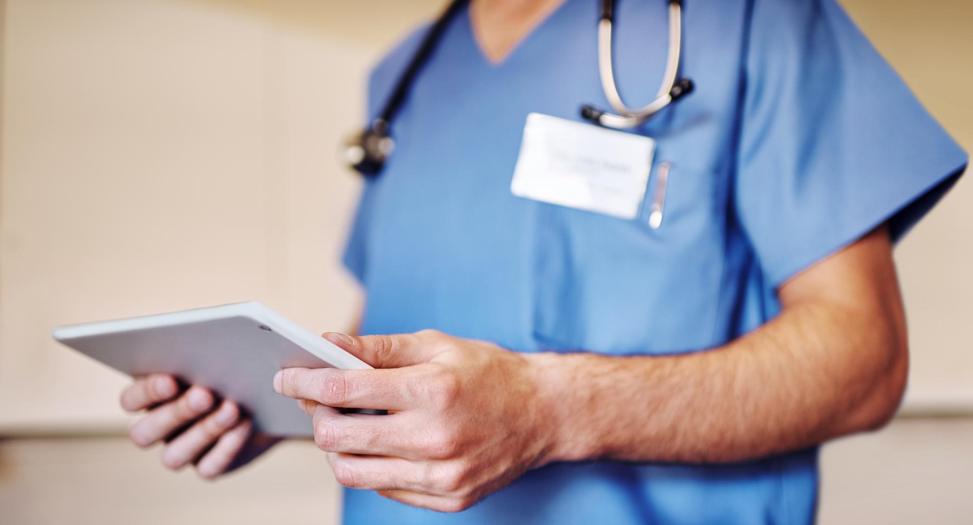 Healthcare worker with a tablet