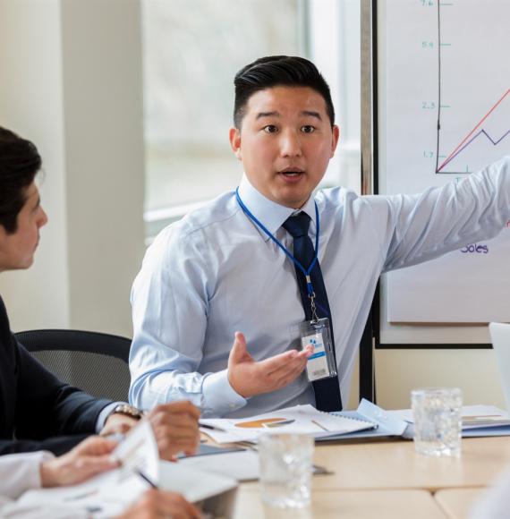 Businessman demonstrating a chart