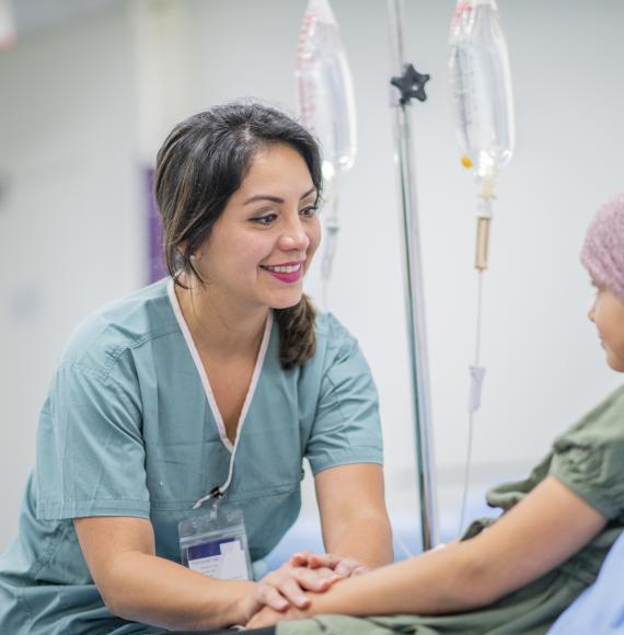 Female nurse providing care to child