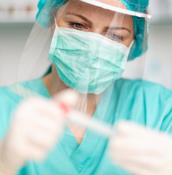 Female health professional wearing PPE