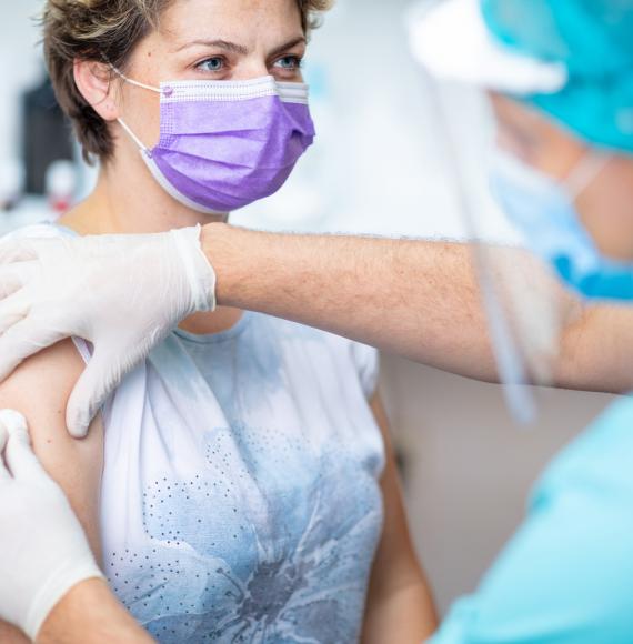 Woman receiving flu vaccination