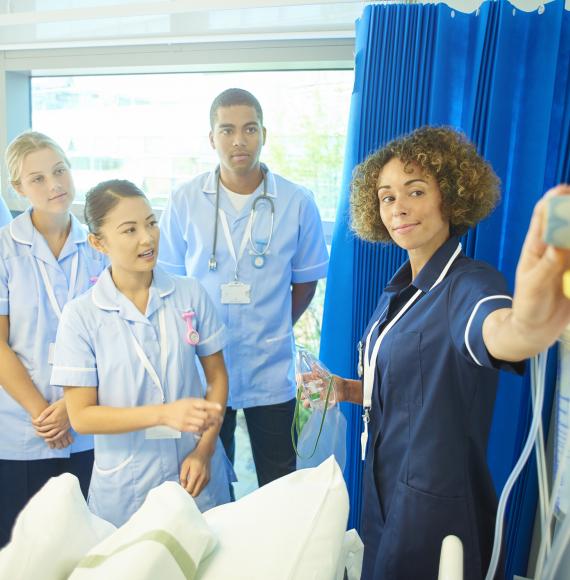 Nurse showing students