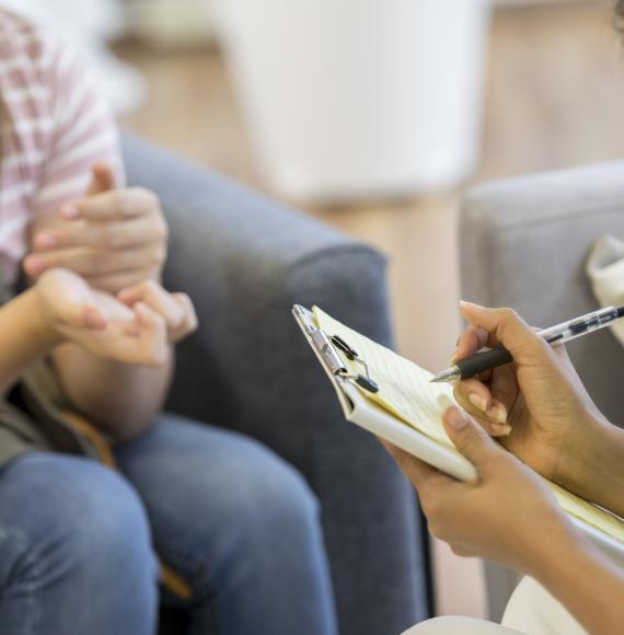 Young person talking to a health professional 