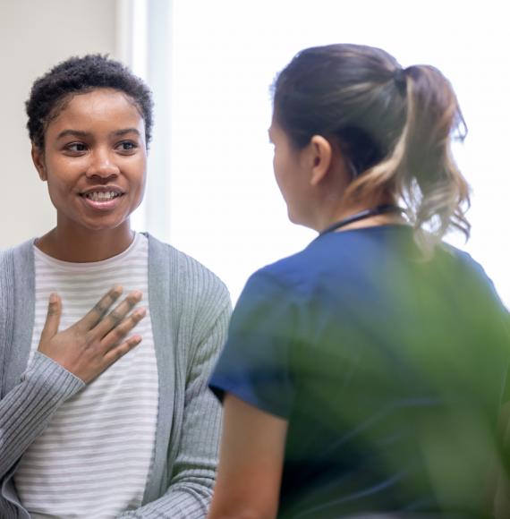 Patient having a conversation with a nurse