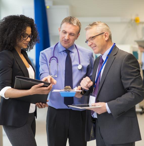 Hospital staff in discussions as a group