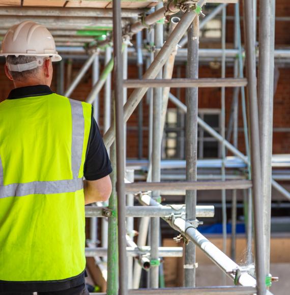 Construction worker on scaffolding