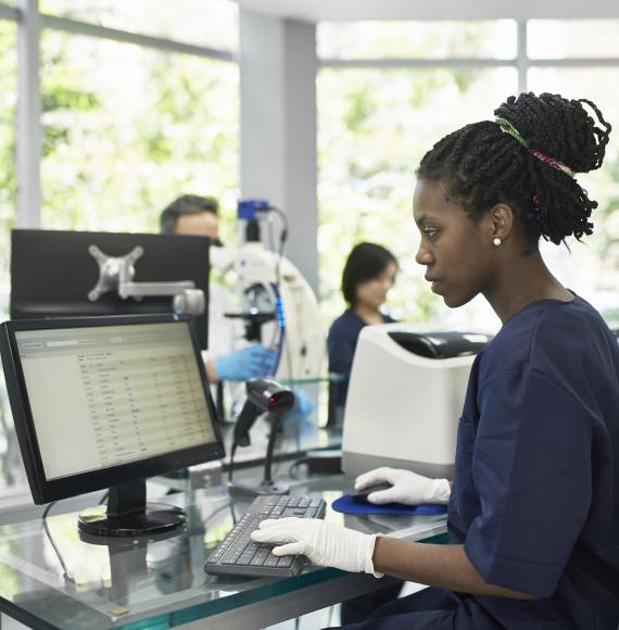 Health professional accessing data on a computer